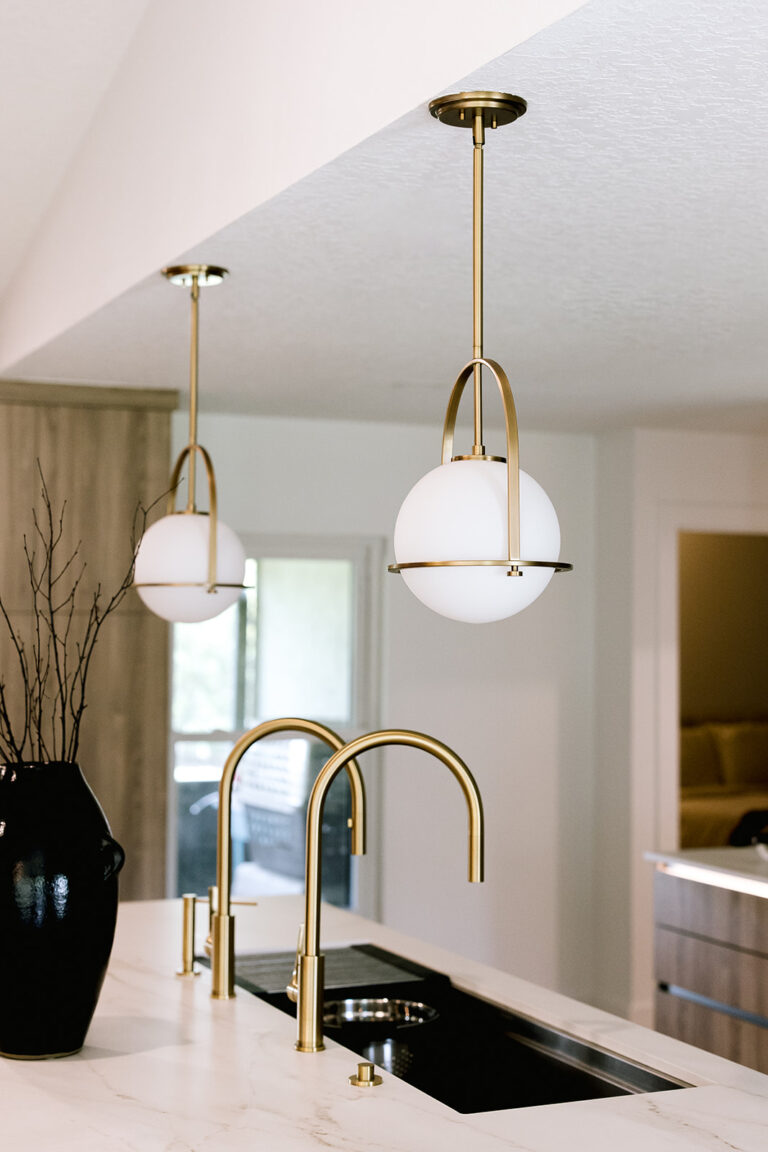Pendants over Kitchen Island in Orlando Kitchen Remodel by KBF Design Gallery