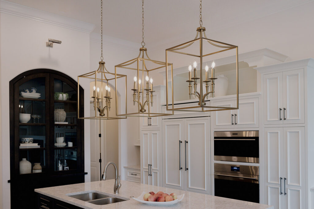 Designer Pendants over Kitchen Island in Kitchen Remodel by KBF Design Gallery