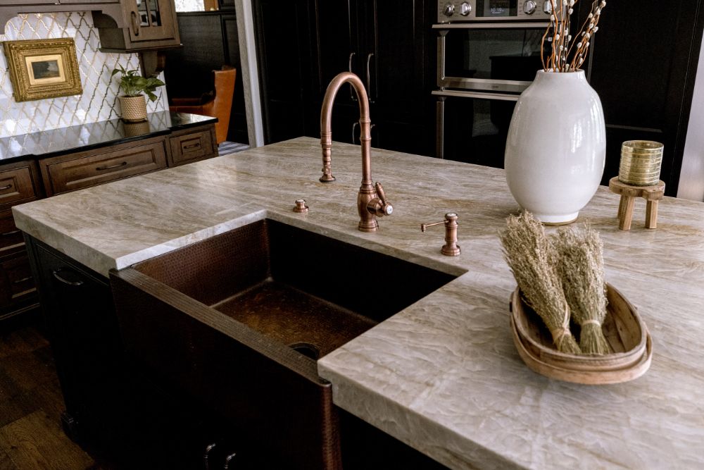 Quartzite countertop in kitchen remodeled by KBF Design Gallery