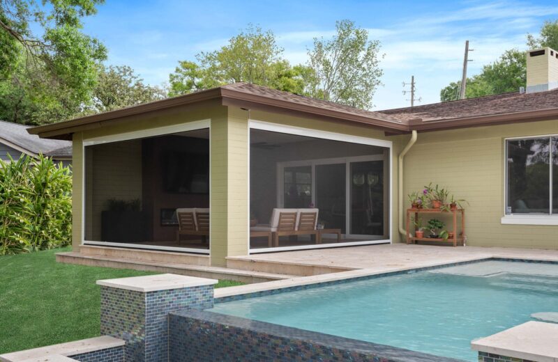 Retractable screen around outdoor living room