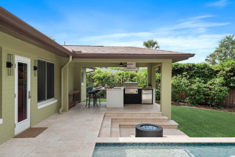 Outdoor kitchen and pool by KBF