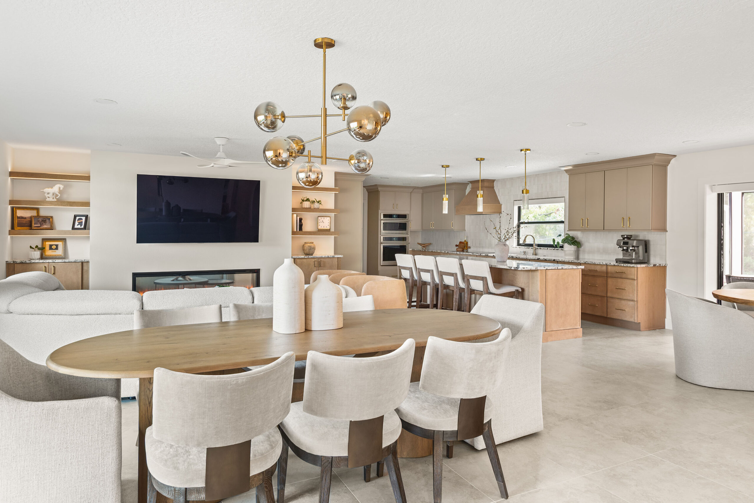 Winter Park whole-home renovation — dining, living, and kitchen zones open to one another in a single connected space