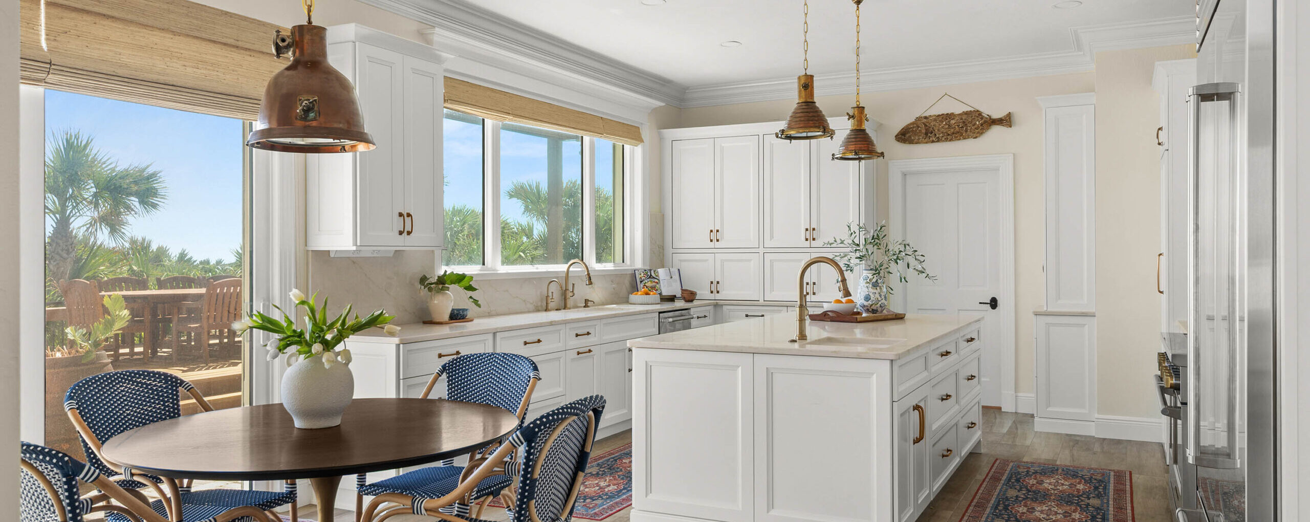 Coastal kitchen remodel in a New Smyrna Beach oceanfront home by KBF Design Gallery