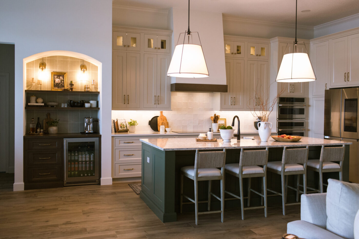 Layered lighting in a kitchen designed and remodeled by KBF Design Gallery in Central Florida.