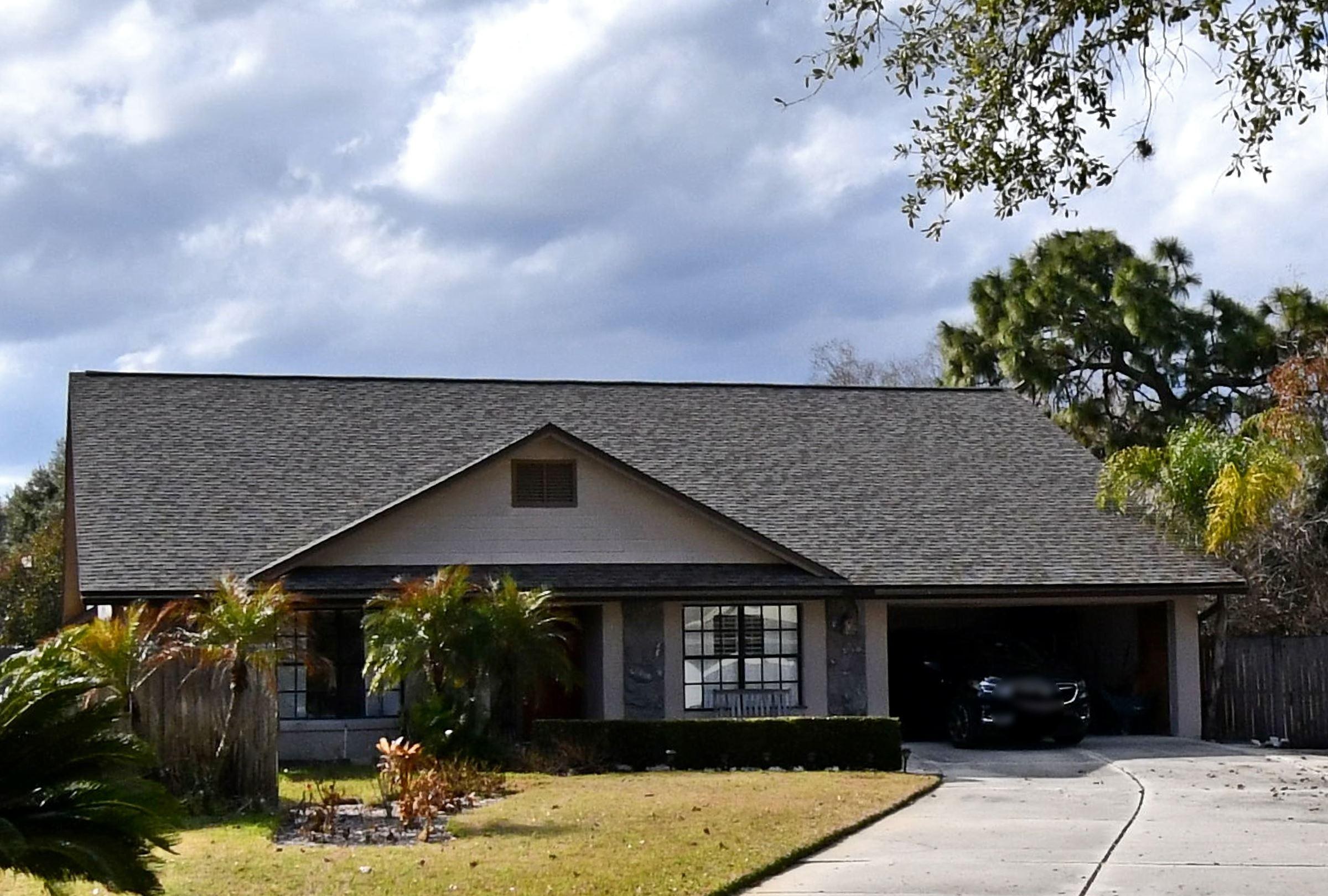 Exterior of the O'Hanlon Court home in Oviedo, Florida &mdash; a primary bath remodel by KBF Design Gallery helped this property sell for $510,000, setting a street price record.