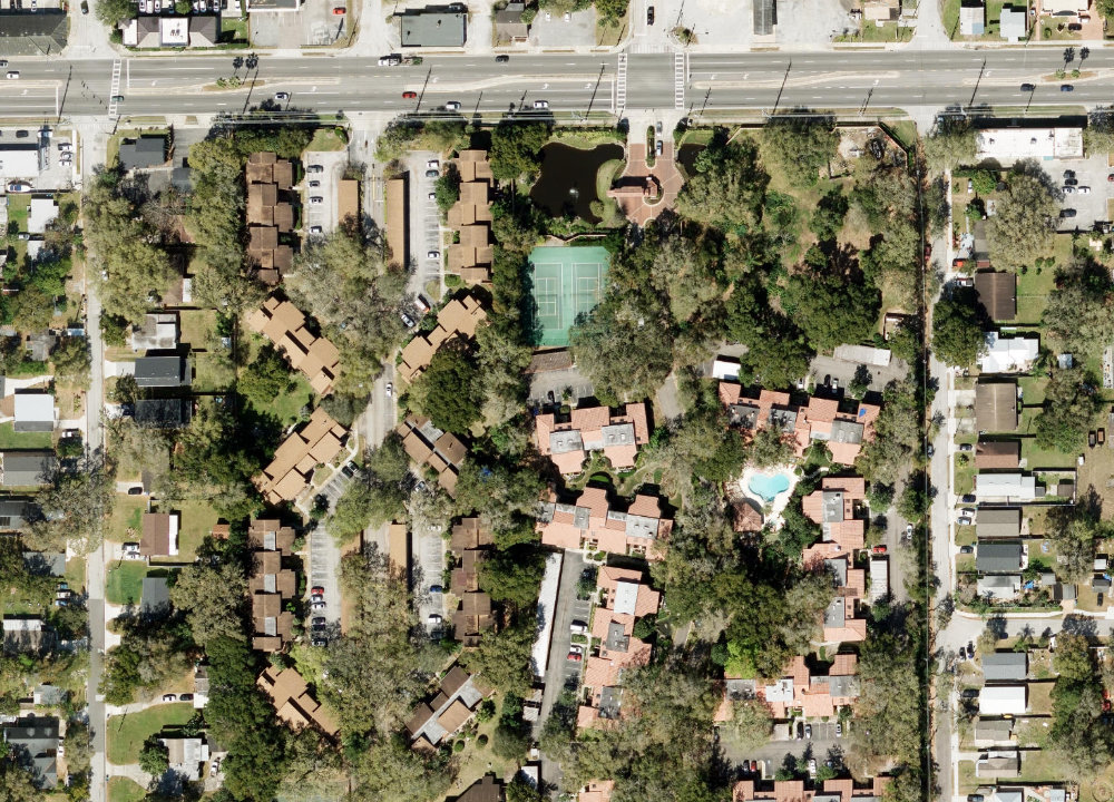 Aerial view of Lake Pineloch Village, the guard-gated lake community in Orlando where a KBF Design Gallery interior remodel helped a St. Tropez Circle home sell for $485,000 &mdash; the highest price in the community.