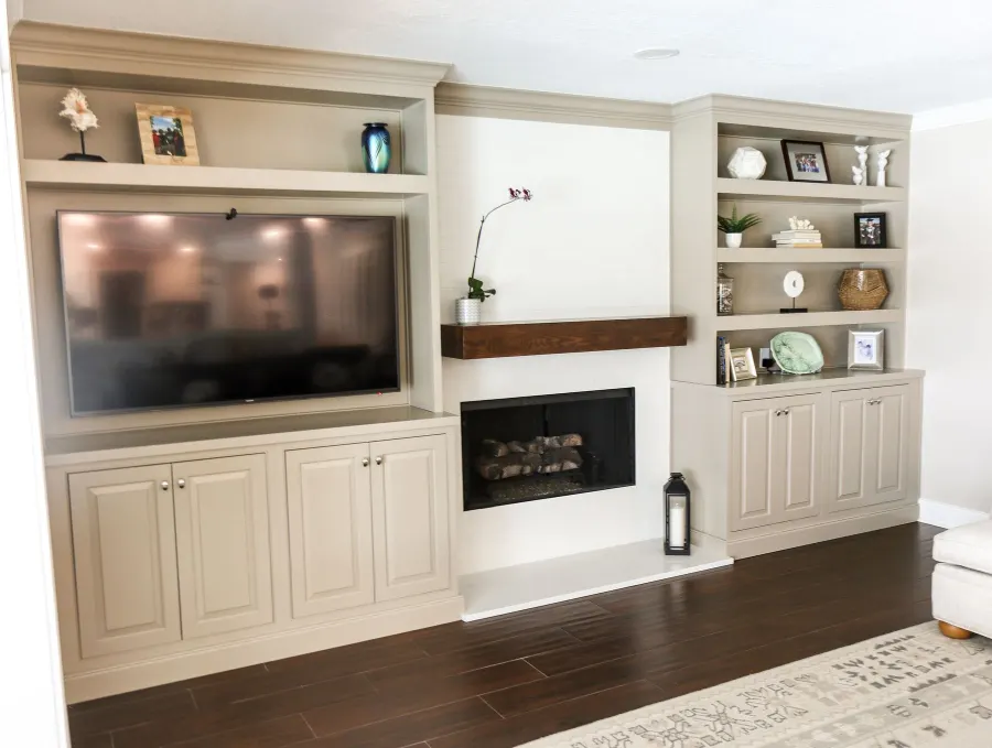 The fireplace wall with custom built-ins