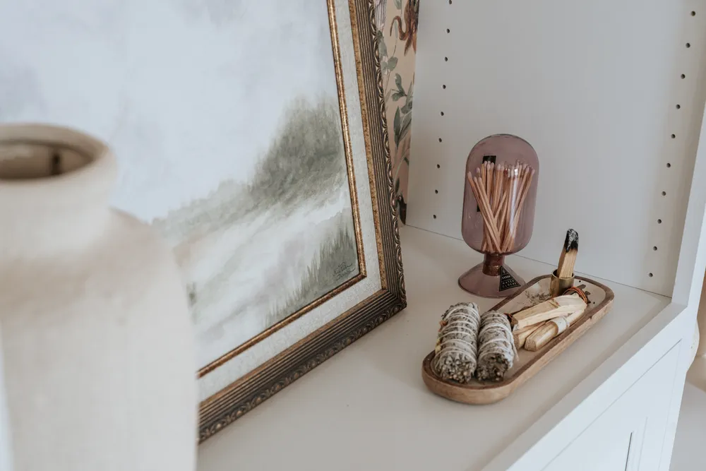 A hand-painted botanical wallpaper detail in the finished home