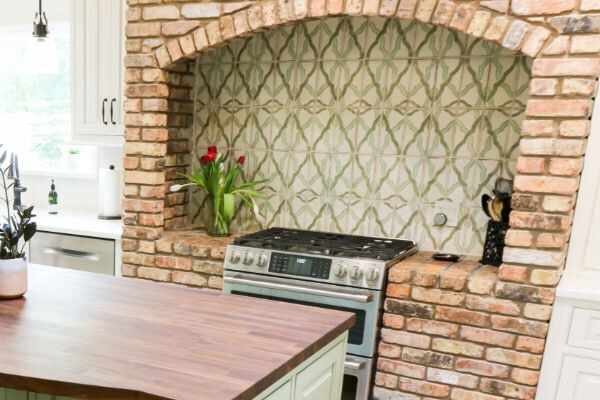 Brick range alcove with patterned tile &mdash; Modern Cottage kitchen, Winter Park
